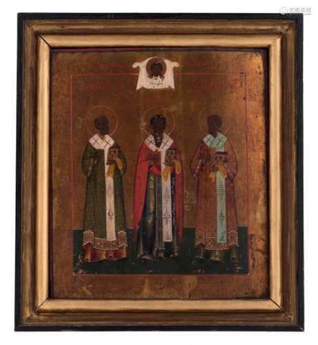 An East European icon of three saints, 19thC, 31,5…