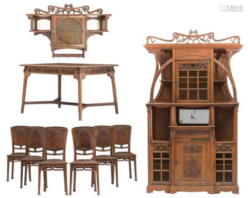 An oak Art Nouveau style dining room set, probably…