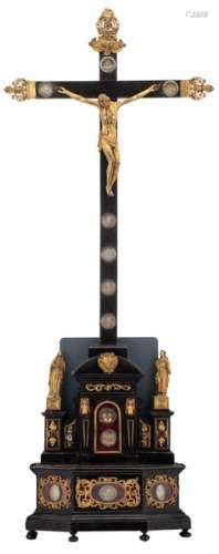 A 19thC ebonised wooden reliquary crucifix contain…