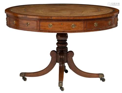An English regency style mahogany drum table, with…