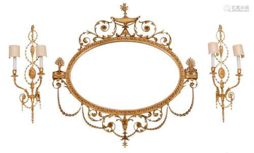 A neoclassical gilt wood oval mirror; added a matc…