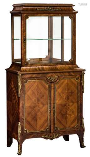 A neoclassical rosewood display cabinet with gilt …