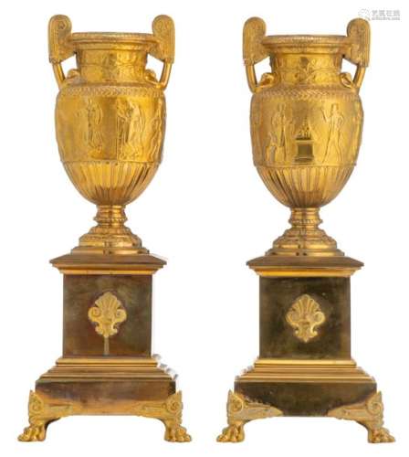 A pair of gilt, patinated and polished bronze Medi…