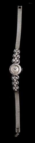 An 18ct white gold ladies wrist watch, set with ca…
