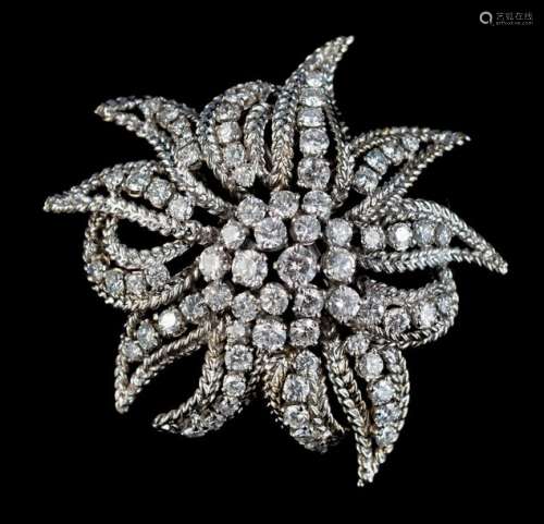 An 18ct white gold edelweiss shaped brooch, set wi…