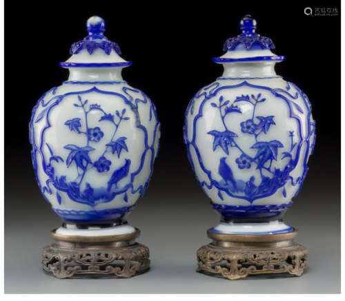 PAIR CHINESE BLUE AND WHITE PEKING GLASS COVERED JARS
