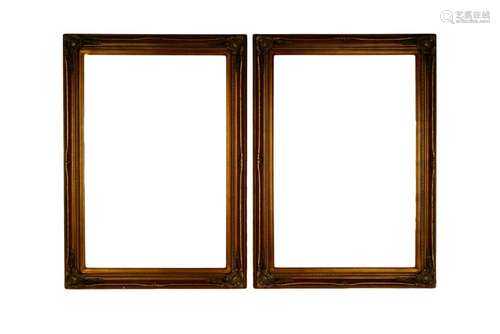 PAIR 20TH C ORNATE GILT & GESSOED WOOD FRAMES