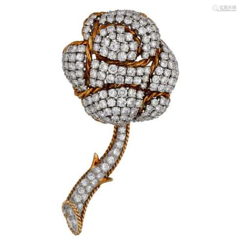 Diamonds flower-shaped brooch.