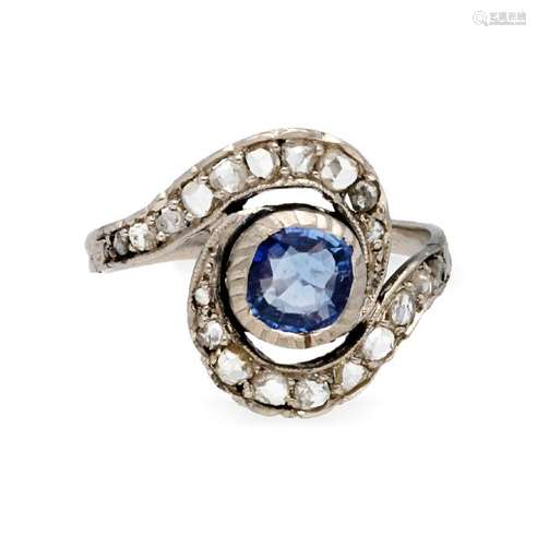 Art DÃ©co style ring with sapphire and diamonds.