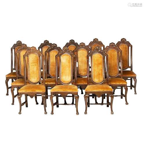 Set of twelve Spanish chairs of English style in carved