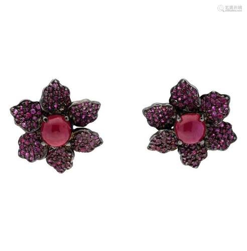 Flower-shaped rubies earrings.