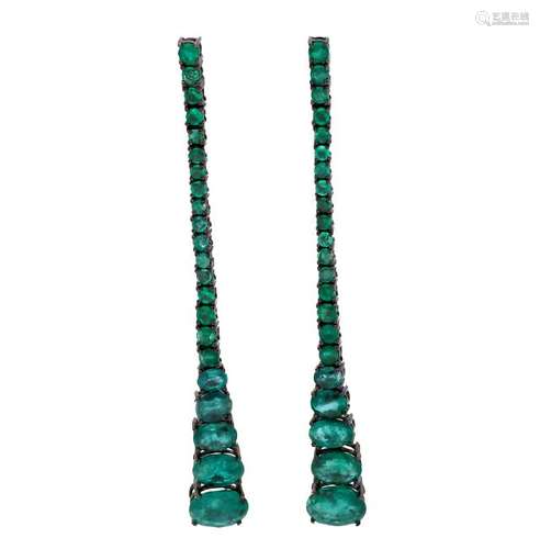 Emeralds long earrings.