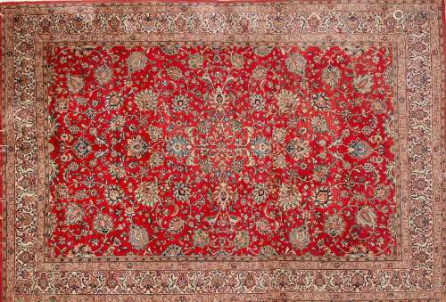 Persian wool and silk carpet, mid 20th Century.