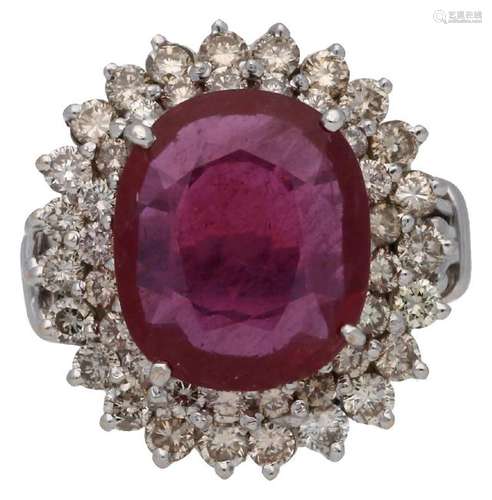 Ruby ring with diamonds border.