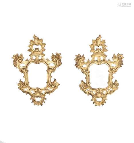 Pair of Rococo-style ornamental mirrors in carved and