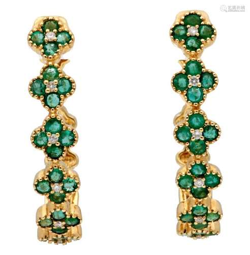 Emeralds creole earrings.