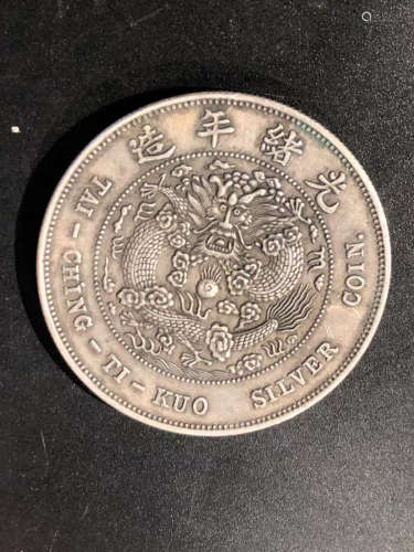 A SILVER COIN