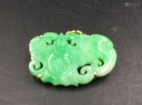 A BAT SHAPED JADEITE BROOCH