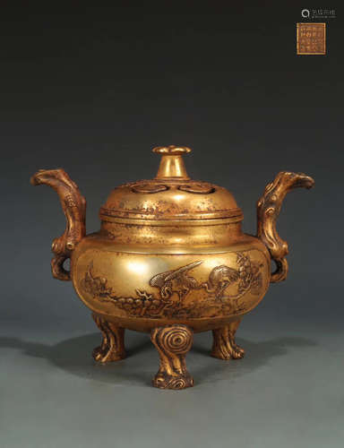 A GILT COPPER CRANE PATTERN TRIPOD CENSER