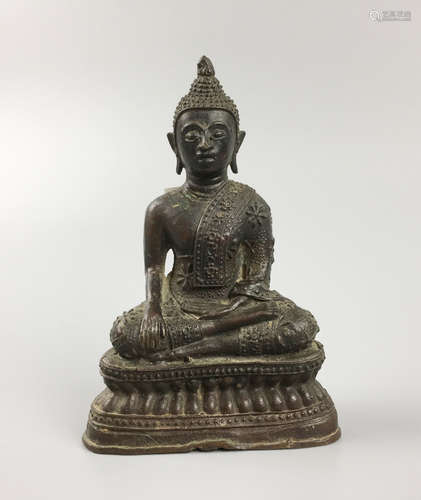 A BRONZE SHAKYAMUNI BUDDHA