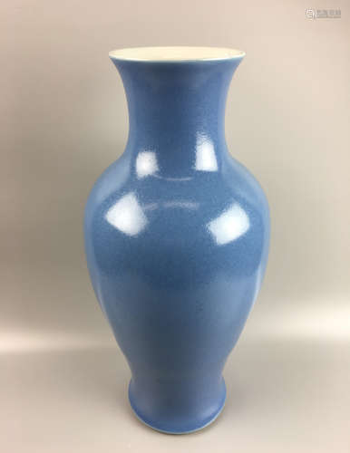 A TIANQING CELADON GUANYIN VASE