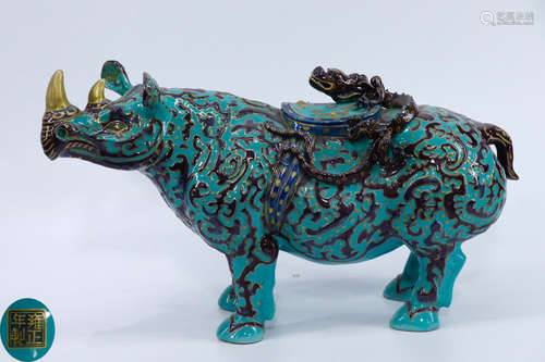 A CLOISONNE CASTED RHINOCEROS SHAPED PENDANT