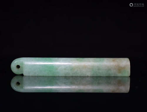 A JADEITE CARVED TUBE SHAPED PENDANT