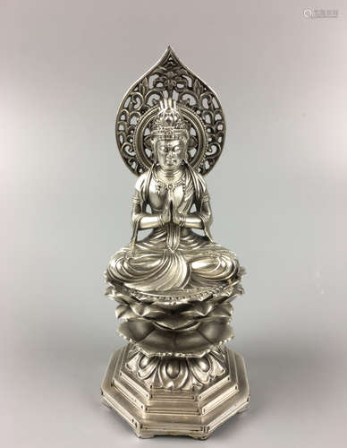 A SILVER LOTUS SHAPED BASE BUDDHA