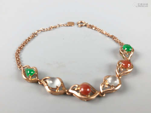 A K-GOLD INLAID JADEITE BEADS BRACELET