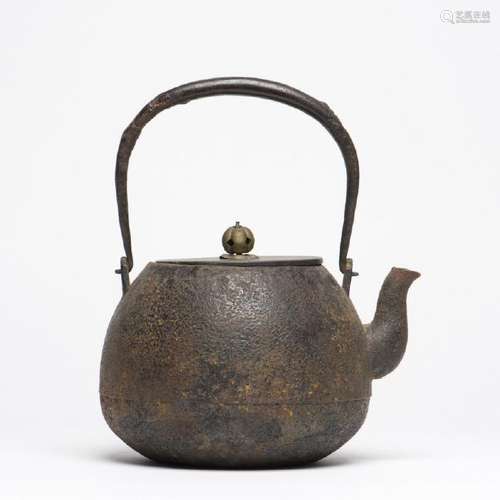 A JAPANESE TETSUBIN CAST IRON TEAPOT