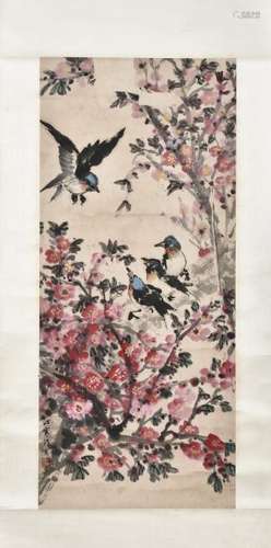 A CHINESE SCROLL PAINTING OF FLOWERS AND BIRDS