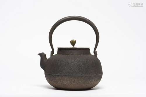 A JAPANESE TETSUBIN CAST IRON TEAPOT