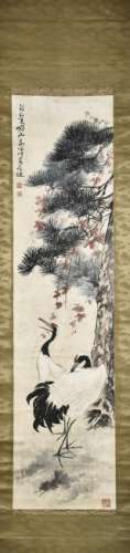 A CHINESE SCROLL PAINTING OF CRANES