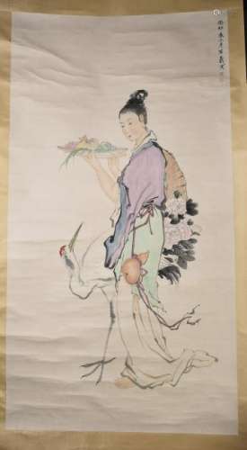 A CHINESE SCROLL PAINTING OF LADY