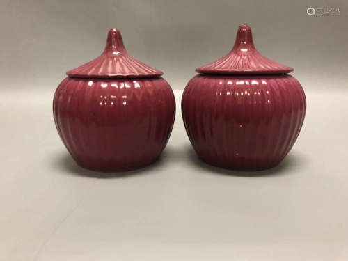 A PAIR OF RED GLAZE GO JARS, QING DYNASTY