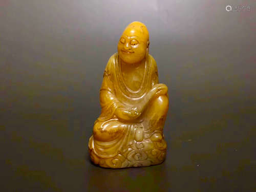 A BUDDHA DESIGN FIELD YELLOW STONE ORNAMENT