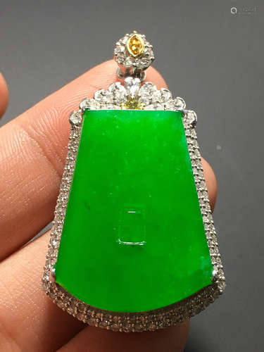 A ZHENGYANG GREEN ICE JADEITE PENDANT