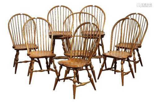 (lot of 8) David T. Smith Windsor style chairs, each having a spindle back, above a shaped seat