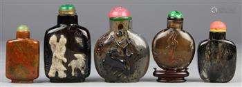 (lot of 5) Chinese stone snuff bottles: first, of rutilated quartz (hair crystal) with a flattened