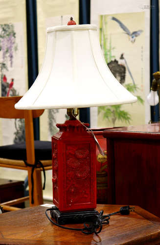 Japanese cinnabar lamp, vermilion lacquered rectangular body with flowers, on wood stand, approx.