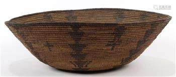 Large Apache woven basket, having arrow, cross and figural motifs throughout, 16.5