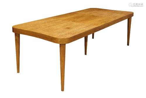 Gilbert Rohde Paldao Group dining table, by Herman Miller circa 1940, having a shaped rectangular