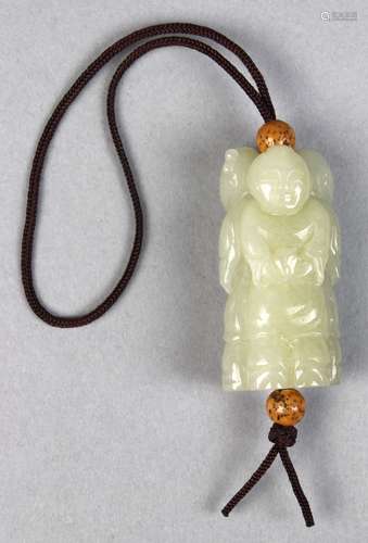 Chinese hardstone children toggle, with three standing children each holding an auspicious item,