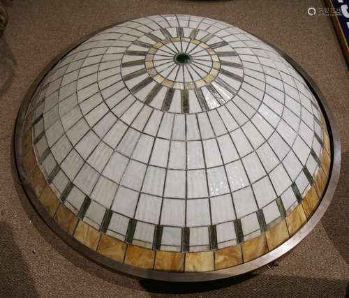 Arts and Crafts style leaded glass pendant lamp, having a dome form with carmel, cream and green