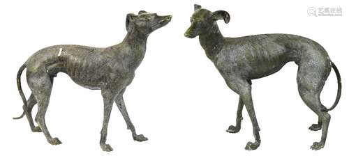 Pair of patinated bronze whippets, each depicted standing and gazing outward with a dignified