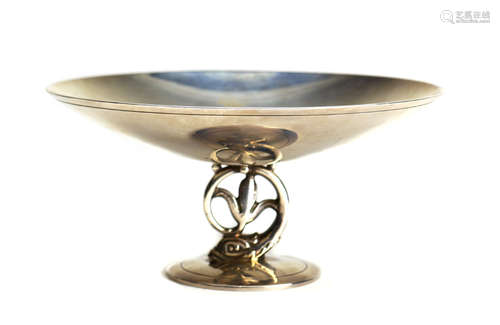 Tiffany & Co. sterling silver nut compote, after 1938, having a circular bowl on a dolphin form