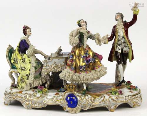 German porcelain figural group, depicting a pianist and dancers, each dressed in classical attire