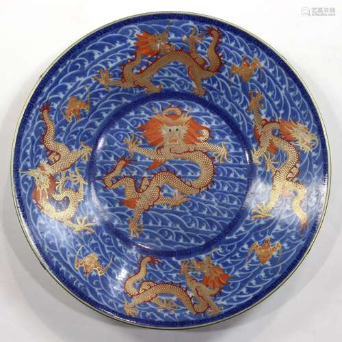 Chinese large porcelain charger, interior with five gilt enameled four-claw mang dragons and bats