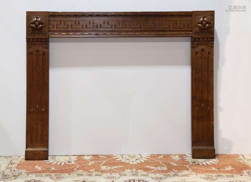 Continental carved and marquetry decorated fireplace surround circa 1860, having large relief carved