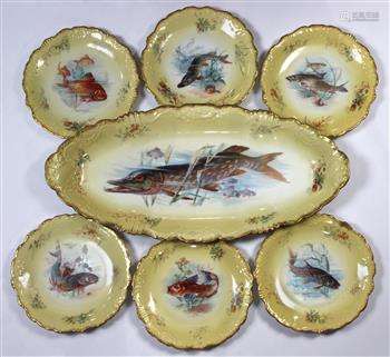 (lot of 7) French Limoges porcelain fish service, depicting an eel and karp if fine detail,